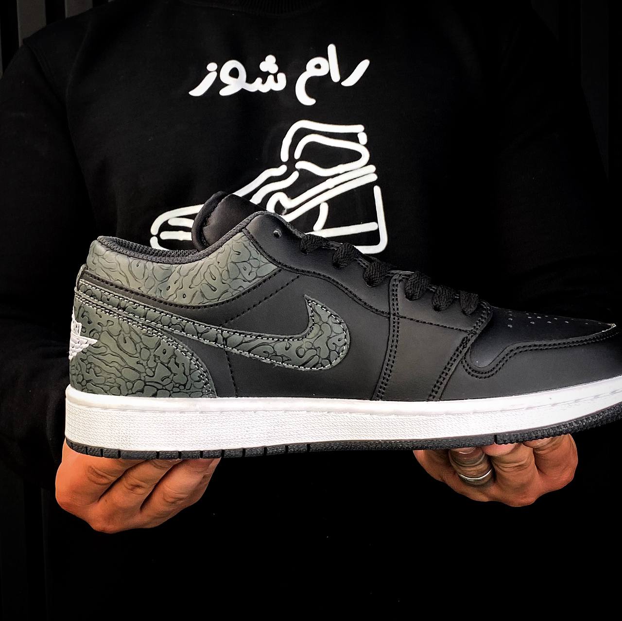 nike black elephant tracksuit