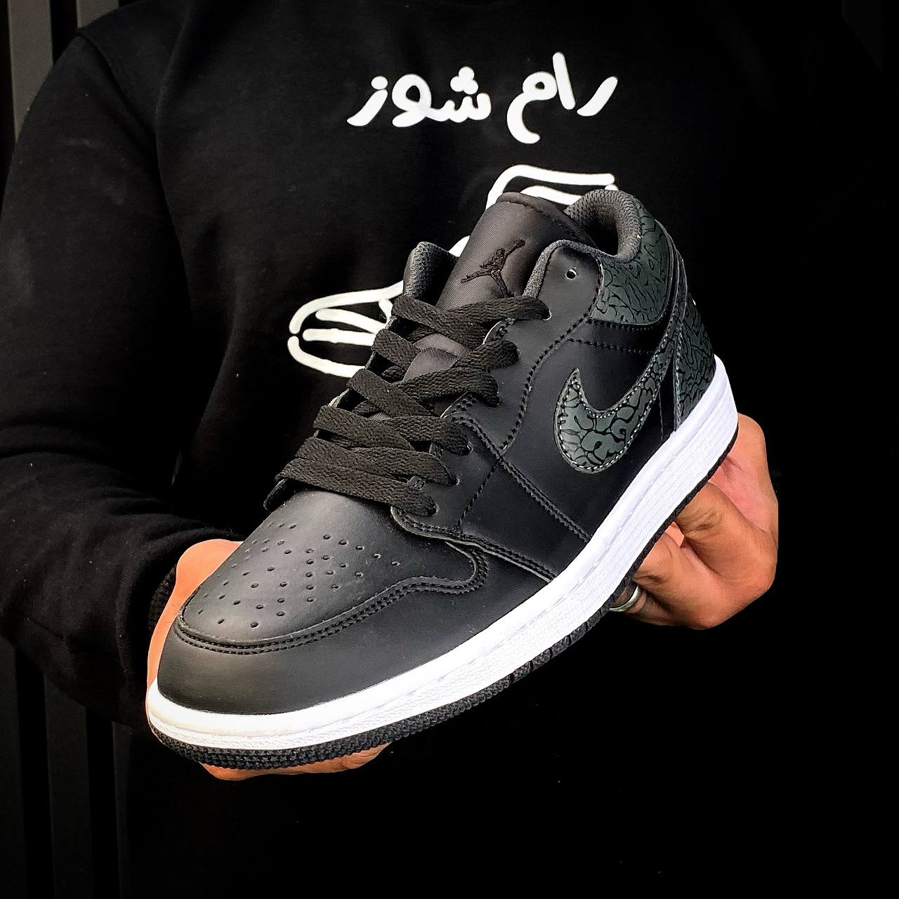 nike black elephant tracksuit